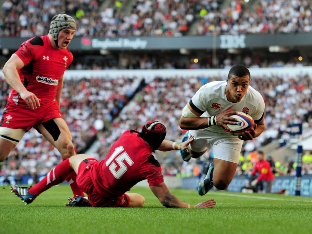 Luther Burrell scoring a try for England against Wales at Twickenham